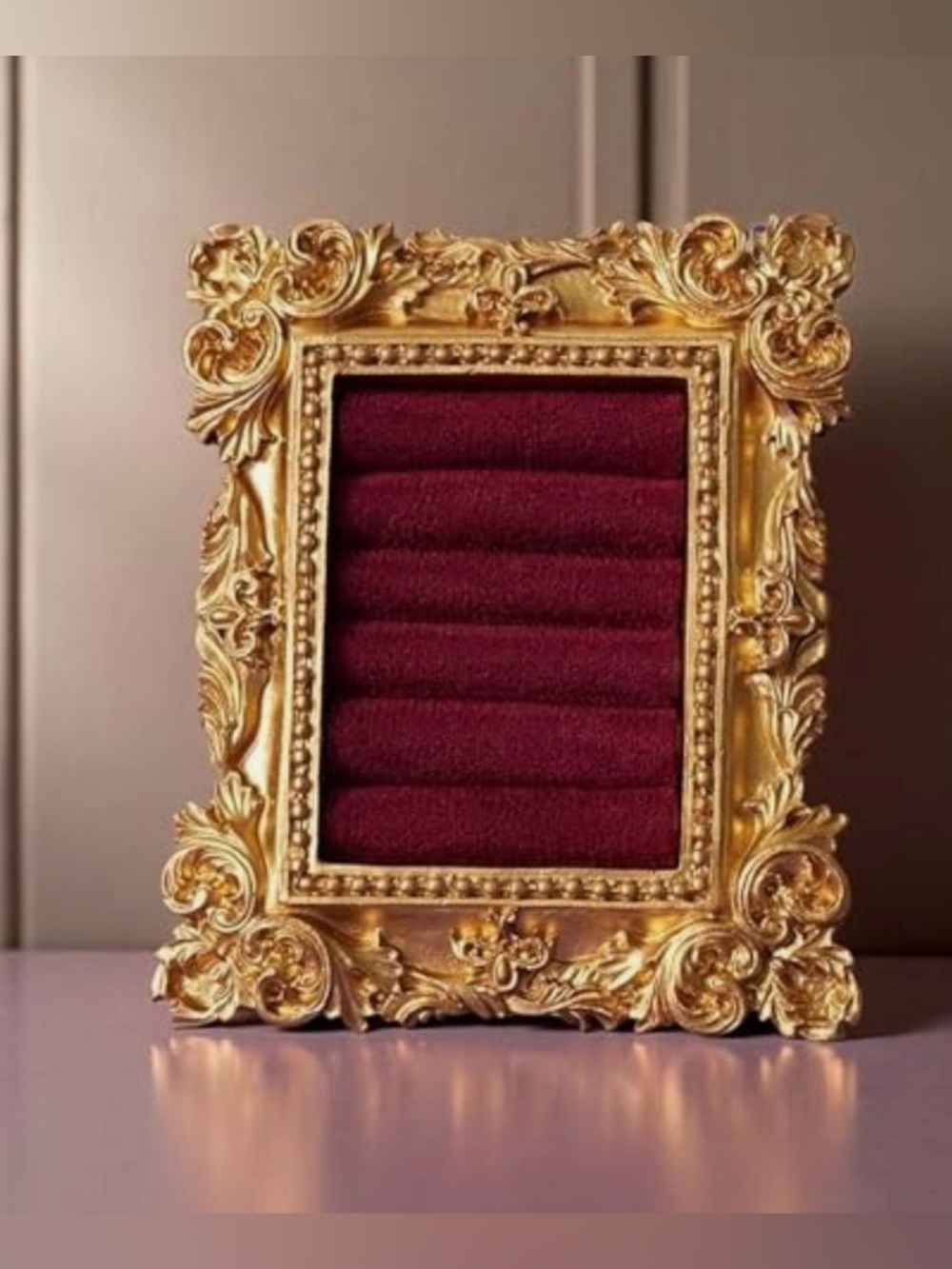 Ornate Gold Jewelry Ring Display with Red Velvet Rows